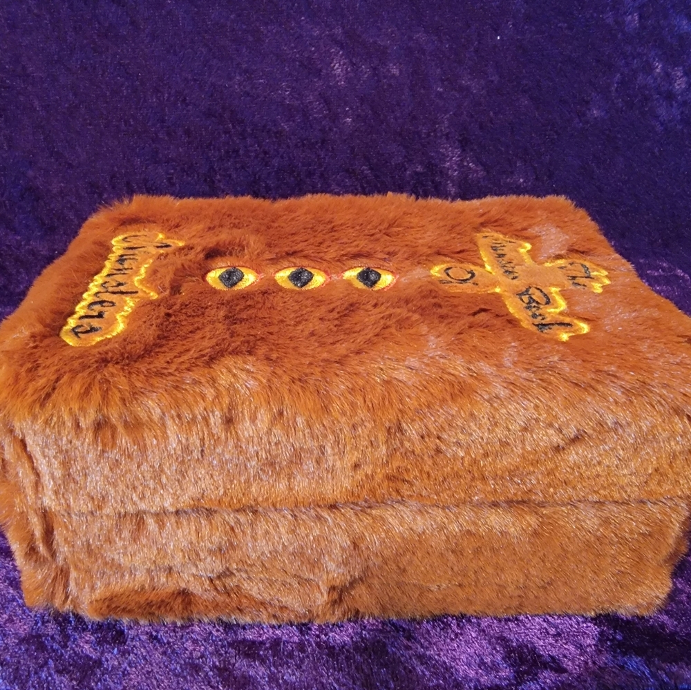 Harry Potter storage box decorated like the monster book of monsters.
